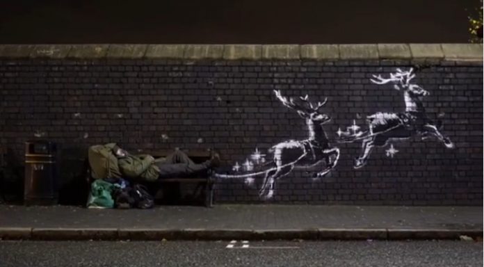 Um sem-teto se torna Papai Noel no novo mural de Banksy que nos lembra a importância da solidariedade