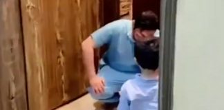 Enfermeiro se desespera por não poder abraçar o filho durante a pandemia de COVID-19