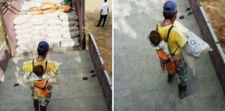 Pai viúvo carrega filho enquanto trabalha em construção