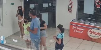 [VIDEO] Jovem argentina tira o vestido e o usa como máscara para entrar em loja