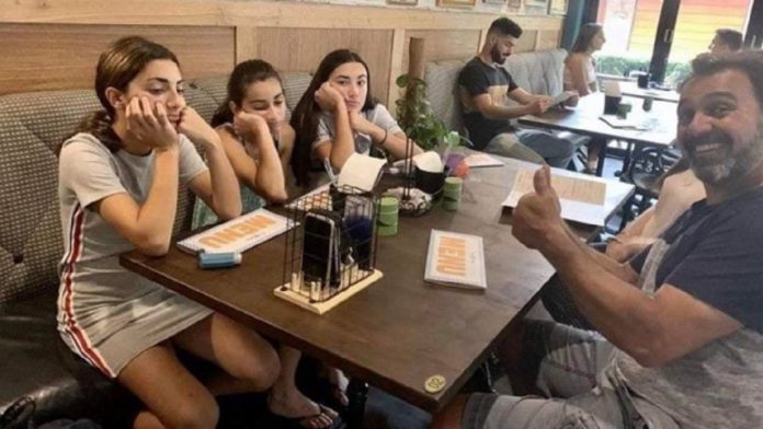 Foto viral de família em restaurante  mistura de “criatividade e tragédia”